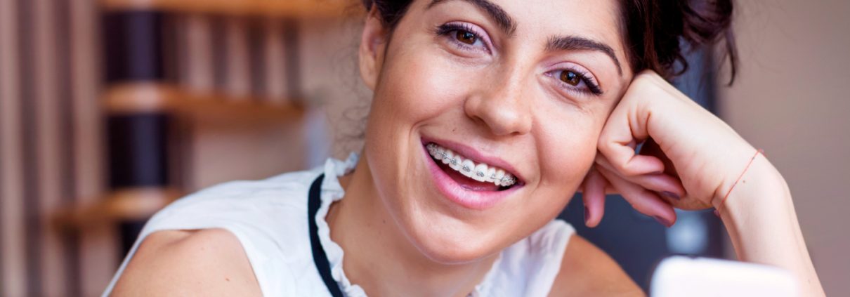 close-up-happy-girl-with-her-mobile